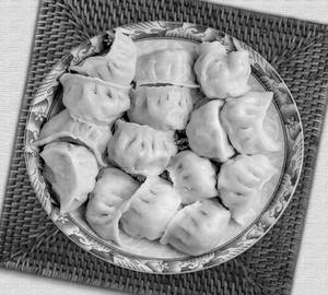 Chicken steamed momo [8 pieces]