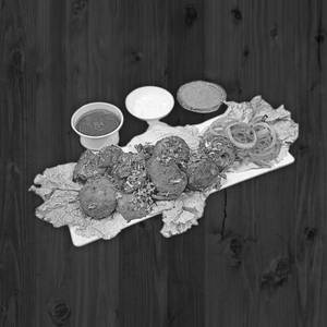 Veg Achari Momos [8 Pieces]