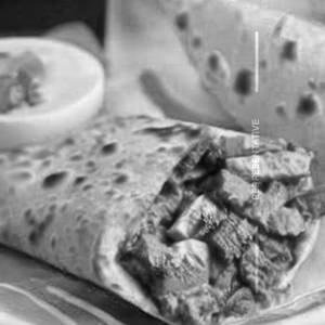 Paneer Schezwan Shawarma In Paratha