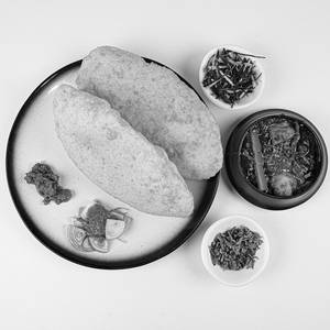 Paneer Stuffed Desi Ghee Bhatura With Chole & Aloo Dum (2 Pc)