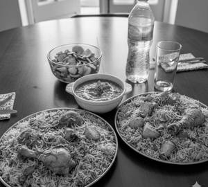 2 Chicken Biryani 1 Potato Biryani with Gravy Salad 1 Litre Water