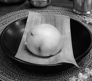 Kozhikatta (steamed Jaggery Coconut Round Rice Cake)
