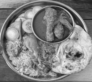Thali Combo Chicken Curry ,3 Roti & Chicken Biryani+ salad