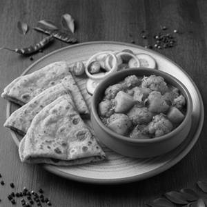 Aloo Gobhi With Choice Of Breads