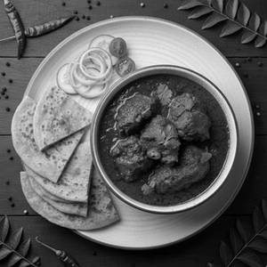 Mutton Kosha With Choice Of Bread