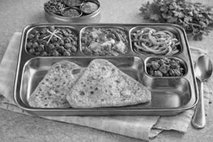 Pindi Chole Paneer Curry Signature Paratha Thali