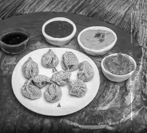 Chicken Cheese Afghani Momo