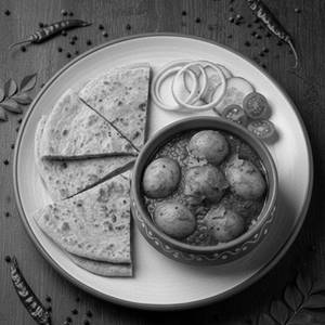 Aloo Dum With Choice Of Breads