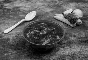 Exotic Vagetables With Fresh Red Chilli And Basil Leaf Gravy