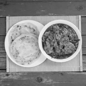 Parotta with Chicken Curry (2pc)