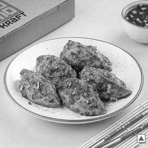 Chicken Pan Fried Momo In Hot Garlic Sauce