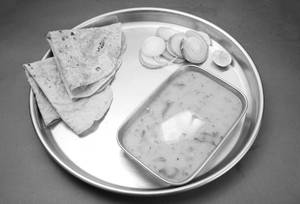 Yellow Dal [250 ml] with 2 Tandoori Roti