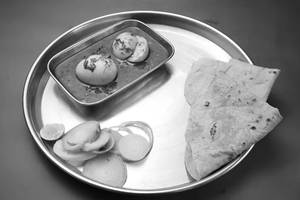 Egg Curry [2 Eggs, 250 ml] with 2 Tandoori Roti
