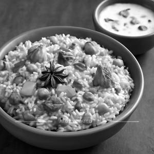 Veg Biryani Curry And Raita