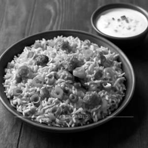 Veg. Biryani+raita