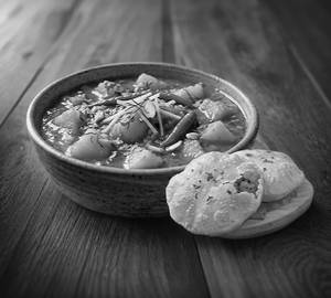 Aloo Tamatar Sabji [4 Poori] +Free Papad