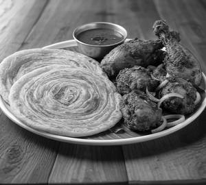 1 Piece Chicken Fry + 2 Porotta + Gravy