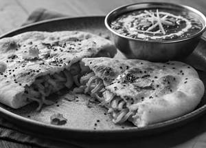 Onion Kulcha with Dal Makhani   