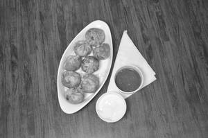 Veg Supremo Fried Momos (8 Pcs)