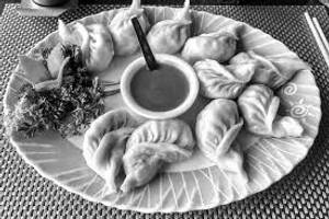 Veg afghani momos [8 pieces]