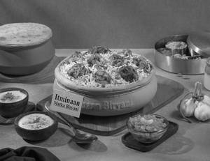 1 KG Overload Chicken Matka Biryani + FREE Dessert