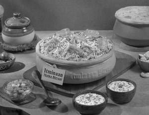 1 KG Paneer Makhani Matka Biryani + FREE Dessert
