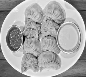 Soya deluxe steamed momos [8  pieces ]