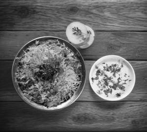 Veg Biryani Half With Raita ....