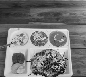 Paneer chur chur naan with paneer butter masala with dal makhani with raita combo