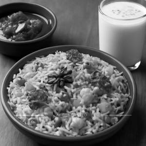 Veg Biryani With Double Ka Metha And Badam Milk