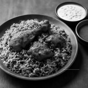 Gongura Chicken Biryani [ served with raita and salan ]