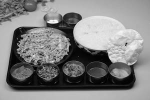 Hot Kanji Meal With Netholi Fish Peera