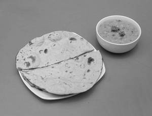 2 Piece Roti With Dal Fry