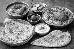 Butter Chicken(2pcs.) Chicken Biryani(1pcs) 1 Butter Naan, 1 Gulabjamun ,salad, Dahi Raita
