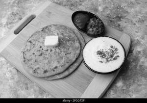 Aloo Paratha 2pc+raita+mango Pickle