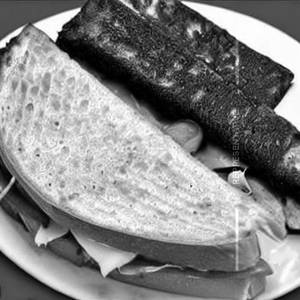 Cheese schezwan paneer grilled sandwich