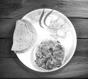 Aloo baigan chokha with 4 butter roti and salad