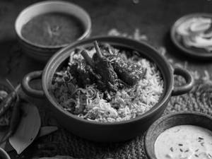Basanti pulao with mutton kosha [2 pieces]
