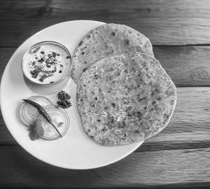 2 Classic Stuffed Aloo Paratha + Curd