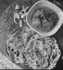 4 Nos. Tawa Paratha With Raita  & Aloo Tamatar Ki Sabzi