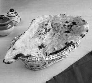 Butter Naan ( 1 Pc )