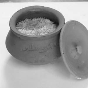 Lucknawi Dum Handi Navratan Veg Biryani