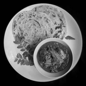 Chicken Chettinad With Malabari Parotta (1Pcs)