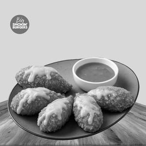 Veg Cheese Baked Momos