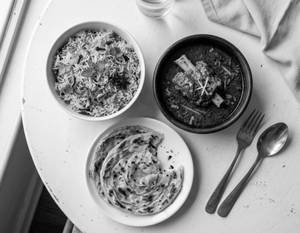 Mutton Gravy(1pc) +biryani Rice+ 2paratha