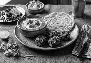 Butter Chicken Boneless[250ml]+Awadhi Murg Tikka [4 Pcs]+ Roghani Parantha [1 Pc]