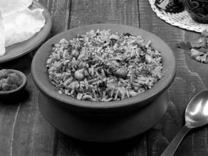 Puliyogare Rice Bowl (Hand Tossed)