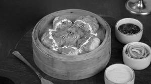 Veg Momos In Makhni Gravy