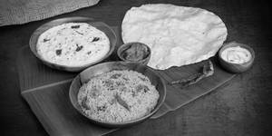 Curd Rice(200gm), Veg Biryani(200gm) & Papad(1pc)