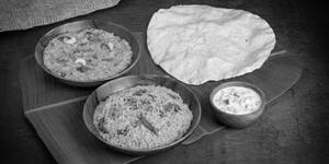 Sambar Rice(200gm), Veg Biryani(200gm) & Papad(1pc)